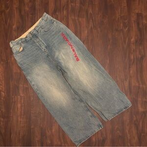 Balenciaga Relaxed Fit Blue Jeans with Red Logo